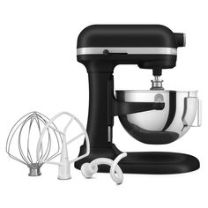 an image of a black and white kitchen mixer set up with attachments for mixing