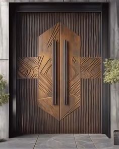 a large wooden door with an intricate design on it