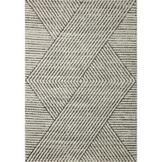 an area rug with black and white stripes on the bottom, and a diagonal design