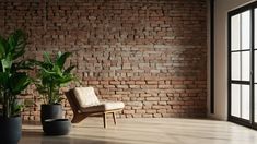 a chair and potted plant in front of a brick wall with large open windows