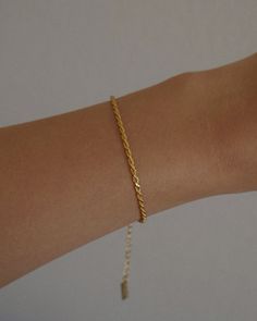 Our Paloma rope chain is great for layering or styling on its own. Its twists and turns of radiant gold are eye-catching but still simple enough for daily wear. A stunning must-have piece for your jewelry collection. THE DETAILS: 24k gold plated brass Chain Thickness: 5 mm Chain Length: 15.5 inches, can be adjusted to Daily Wear Gold Bracelet For Women, Gold Bracelet For Women Classy, Minimalist Accessories Jewellery, Minimal Gold Jewelry, Jewelry Guide, خواتم خطوبة, Gold Jewelry Prom