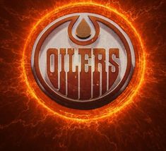 the edmonton oilers logo is shown in flames