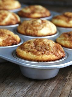 muffins in a pan on a wooden table