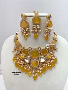 Kundan necklace/choker set comes with beautiful lightweight earrings and tikka/Kundan Polki Necklace/Reception/Wedding/bridal jewelry/ Indian jewelry /Kundan Jewelry/yellow  All items are shipped from Brampton, Ontario, Canada. If you need your item by a certain day, please reach out to us for express delivery option before placing the order.  Standard shipping/delivery timeline Below are the delivery timeline estimates. We dispatch all orders by the next business day. ---> USA delivery timeline Temple Jewelry Style Bridal Necklace In Yellow, Yellow Temple Jewelry Bridal Necklace For Festivals, Festive Yellow Jewelry Sets For Festivals, Yellow Jewelry For Diwali Party, Traditional Yellow Bridal Necklace For Festive Season, Traditional Yellow Bridal Necklace For Diwali, Yellow Kundan Necklace As A Festival Gift, Heavy Yellow Chandbali Jewelry, Bollywood Style Festive Yellow Jewelry