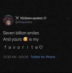 the text on the phone says seven billion smiles and yours is my favorite tweet