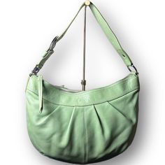 "Coach Lime Green Leather Soho Pleated Shoulder Bag  ▪️Measurements:  Height- 12\" Length- 17\" Depth- 4\" Total Handle Length-23\"  ▪️Excellent condition! Bag has recently been cleaned & conditioned. Leather, interior, and silver hardware are all in well maintained. Interior is flawless w/ the exception of a couple very light spots in the bottom corner.  ▪️No. B1053-F13731 ▪️Material: 100% Genuine Full Grain Cowhide Leather  ▪️Nice large size bag, this shoulder bag can hold a lot of stuff!  ▪️Bag was made in 2010  🫧Follow on Instagram @popleyscloset.pdx No. 446" Casual Leather-lined Shoulder Hobo Bag, Casual Green Soft Leather Bag, Casual Green Satchel With Soft Leather, Green Leather Hobo Bag Casual Style, Casual Satchel With Leather Lining, Casual Green Soft Leather Hobo Bag, Green Leather Casual Satchel, Green Leather, Soho