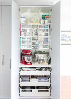 an organized pantry with lots of items in it