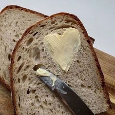 a piece of bread with butter spread on it