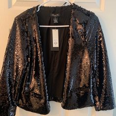 Black Sequenced Jacket Never Worn Black Party Season Blazer, Black Sequined Outerwear For Party Season, Black Blazer For Party Season Workwear, Black Party Season Blazer For Work, Glamorous Black Spring Blazer, Black Sequined Evening Outerwear, Trendy Black Outerwear With Sequins, Trendy Black Sequined Outerwear, Black Long Sleeve Outerwear For Party Season