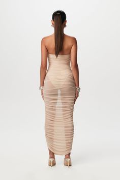 This neutral meets sexy tube maxi dress is designed with a built-in bodysuit, and shirred mesh contrast that gravitates to your ankles. Style with our statement earrings and bangles to complete the look. Mesh Collection Import 95% Nylon, 5% Spandex Lining: 92% Viscose Rayon, 8% Spandex Model is wearing size XS Lined bodysuit for coverage True to size Tube Maxi Dress, Tube Midi Dress, Tube Maxi Dresses, Mesh Maxi Dress, White Midi, Viscose Rayon, Dress Jewelry, Ruched Dress, Black Midi Dress