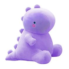 a purple stuffed animal sitting on the ground