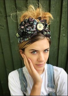 1940s floral print turban style head band. A real statement piece with a standard width inner Alice band attached within the lining to provide an easy to wear design. Completed with quills of fabric, buttons and lined with a fine fleece. The perfect accessory for style and added warmth. This unique creation is a stunning example of a vintage inspired accessory with an eye catching easy to wear and lightweight design. Bohemian Headwrap One Size Fits Most, Bohemian One Size Fits Most Headwrap, Vintage Spring Headband, Hippie Style Headwrap, Hippie Style Headwrap One Size, Bohemian Turban With Matching Headband, One Size Hippie Style Headwrap, One-size Hippie Style Headwrap, Bohemian Adjustable Headscarf With Matching Headband