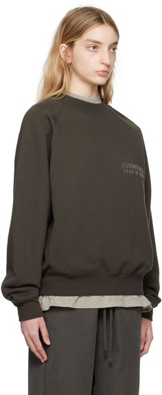 Cotton-blend fleece sweatshirt. · Rib knit crewneck, hem, and cuffs · Logo bonded at chest · Raglan sleeves · Rubberized logo patch at back collar Supplier color: Off-black Essentials Clothing, Raglan Sweatshirt, Fear Of God Essentials, Fear Of God, Clothing Essentials, Knit Crewneck, Fleece Sweatshirt, Raglan Sleeve, Patch Logo