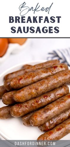 grilled breakfast sausages on a white plate with oranges in the background and text overlay