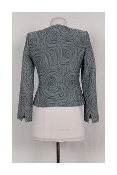 Upscale Armani Collezioni jacket with a unique dark grey stitched rose pattern. Great for evening wear, this unique jacket can be worn with a silk tank top and fitted pencil skirt. You will exude sophistication. Size 2 Made in Italy Dark grey stitching w/ rose pattern Button down front Lined Padded shoulders Bust 32" Waist 28" Shoulder to hem 20" Elegant Fitted Gray Outerwear, Fitted Gray Outerwear, Fitted Gray Blazer For Fall, Unique Jackets, Textured Jacket, Silk Tank Top, Armani Collezioni, Silk Tank, Rose Pattern