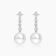 These elegant earrings feature beautiful pearls and twinkling diamonds. The perfect addition to any jewelry collection, these earrings give a luxurious and timeless feel. Luxury White Pearl Diamond Earrings, Luxury White Diamond Earrings With Pearls, Luxury Pearl Diamond Earrings, Modern White Bridal Earrings For Formal Occasions, Pearl And Diamond Earrings, Pearl Jewellery, South Seas, Elegant Earrings, Cultured Pearls