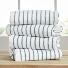 four towels stacked on top of each other