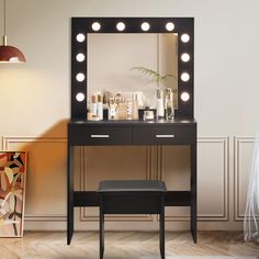 a vanity with lights on it and a stool in front of the mirror that is lit up