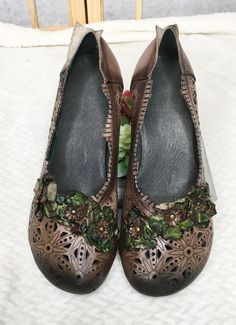 Our beautiful Fairy Shoes are going to make you feel in your own fairytale, with its intricate design and flowers along the top. You won't be just another maiden, because these beautiful shoes are going to make you step up in the shoe game. -Leather upper and rubber sole -Size up if you are a (1/2) size. -2" heel Casual Shoes Outfit Women, Shoe Collection Aesthetic, Womans Outfit, Fairy Slippers, The Shoe Game, Aesthetic Shoe, Shoe Drawing, Shoes Png, Shoes Wallpaper