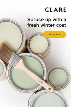 some paint cans and a brush with the words clare spruce up with a fresh winter coat shop now