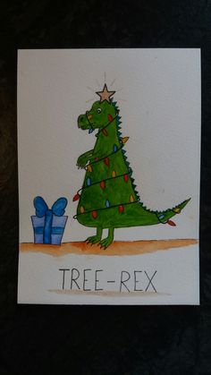 a christmas card with a tree - rex dinosaur holding a blue gift box and the words tree - rex written on it