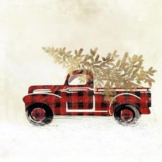 an old red truck with a christmas tree in the back