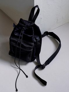 RE;CODE is a leading upcycling fashion brand launched in 2012 in Korea. It breathes new life into discarded inventory by adding creative ideas, giving them a rebirth (RE). - Item made with recycled nylon.- Reflective details on the bag's edges are the highlight, glowing when flashed upon.- Mesh pockets give a refreshing feel to this bucket bag, perfect for the SS season. Black Upcycled Bags For Daily Use, Black Upcycled Bag For Everyday Use, Black Upcycled Travel Bag, Everyday Black Upcycled Bags, Upcycle Bag, Upcycling Fashion, Upcycled Bag, Creative Ideas, New Life