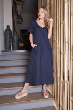 Blue linen boho style summer dress could be a perfect gift for your mother or for yourself!  This dress is made of 100% washed, natural Baltic linen (EU) GIFT - FREE SHIPPING WORLDWIDE * ENLI5 Linen - it's our family creation... for you with love... _ DESCRIPTION  - made from 100% Baltic linen - dress has two comfortable pockets  - model height is 5.7ft (174 cm.) she wears size M - handmade by ENLI5 Linen family in Lithuania (EU) - Color may vary due to different displays * WHY TO CHOOSE US? Every dress is made individually for our clients. If you need small changes in size, please write us a message and together we would find the solution. Our linen is twice washed, so it gets better shape, stylish wrinkles and  indescribable tenderness.  Do not forget that if you really want our products Beach Dresses With Slip Pockets And Relaxed Fit, Beach Dress With Slip Pockets In Relaxed Fit, Relaxed Fit Beach Dress With Slip Pockets, Casual Indigo Maxi Dress For Summer, Blue V-neck Linen Dress For Vacation, Blue Linen V-neck Dress For Vacation, Relaxed Fit V-neck Linen Dress With Pockets, Summer V-neck Linen Dress With Pockets, Summer Linen V-neck Dress With Pockets