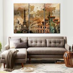 a living room scene with a couch and paintings on the wall in front of it