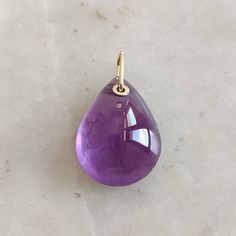 This stunning pendant is set in 14k Solid Yellow Gold with Natural Purple Amethyst with utmost precision. It is an unique gemstone pendant for nearly every occasion and is completely hassle-free jewelry. ITEM DETAILS: Gem : Purple Amethyst  Gem Weight : 23.90carats Gem Size : 17x23mm Gem Shape : Pear cab Gold Weight  : 0.30 gram Gold Purity : 14KT Solid Yellow Gold (58.66 % approx) Gross Weight : 5.08 gram The Gold purity is guaranteed and it comes with an authentic 14KT gold hallmark. Since my Amethyst Drop Jewelry In Yellow Gold, Yellow Gold Amethyst Briolette Jewelry, Yellow Gold Briolette Amethyst Jewelry, Yellow Gold Amethyst Teardrop Pendant Jewelry, Yellow Gold Drop Gemstones For Gift, Purple Briolette 14k Gold Jewelry, Handmade Jewelry Box, Amethyst Gem, Jewelry Christmas