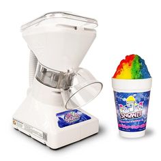 an ice cream maker next to a rainbow colored cup