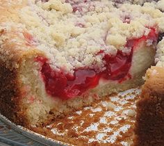 a close up of a cake with crumbs on it