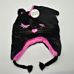 Keep Your Little Warm This Winter In This Laplander Style ,Kitten Face, Winter Hat And Gloves Set. Made Of A Durable Acrylic Knit Exterior And A Soft Micro-Fleece Inside Lining For Comfort And Warmth. Condition: Nwt Pink Cat Ears Hat For Winter, Pink Winter Hat With Cat Ears, Pink Novelty Winter Hats, Adjustable Black Hat With Cat Design, Fun Black Warm Hats, Playful Black Warm Hats, Cute Pink Winter Mini Hats, Playful Black Adjustable Hat, Cute Fitted Hats For Playtime