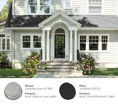 an exterior color scheme for a house with white trim and gray shingles, including the front door