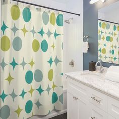 Retro-patterned shower curtain with teal and green ovals and starbursts in a modern white bathroom with marble countertop. Small Mid Century Bathroom Shower Curtains, Mid Century Geometric, Geometric Shower Curtain, Mid Century Modern Bathroom, Teal And Green, Green Oval, Cabinet Door Handles, Table Runner And Placemats, Personalized Wall Art