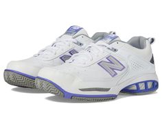 the new balance 996 tennis shoe is white and purple