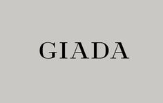 the word giada in black on a gray background