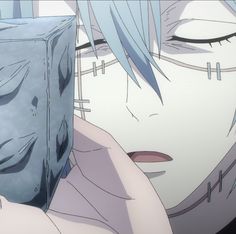 an anime character with blue hair and white eyes holding a block of ice in front of her face