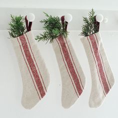 Our Red Stripe Grain Sack Stockings, Set of Three looks so charming whether you're Christmas style is French Country, Vintage Farmhouse, or classic Nordic style. This set of three mini stockings offers an old-fashioned look, inspired by French grain sacks. 100% Cotton. Set of Three. Christmas Decor Farmhouse Style, French Country Christmas Decor, Country Christmas Decor, Drop Cloth Projects, Christmas Decor Farmhouse, French Country Christmas, Vintage Christmas Stockings, Mini Stockings, Farmhouse Fabric