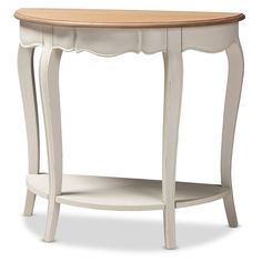 a white table with an oval wooden top