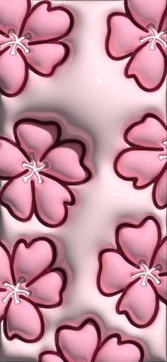 some pink flowers are arranged in the shape of hearts