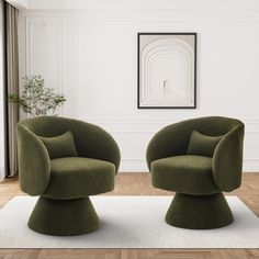 two green chairs sitting on top of a wooden floor next to a white area rug