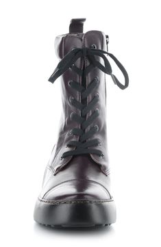 Utilitarian attitude is the name of the game with this lace-up leather boot fashioned with a padded collar and sleek wedge heel. 2 1/2" heel; 1" platform 6 1/4" shaft Lace-up style; side zip closure Removable, cushioned insole Leather upper/textile lining/rubber sole Made in Portugal Leather High Ankle Wedge Boots With Lug Sole, Fall Wedge Lace-up Boots With Lug Sole, Fall Lace-up Wedge Boots With Lug Sole, Lace-up Wedge Boots With Reinforced Heel, Leather Lace-up Platform Wedge Boots, Leather High Ankle Platform Boots With Laces, Leather Platform Boots With Laces, Leather Lace-up Platform Boots With Padded Ankle, Womens Combat Boots