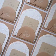 wedding stationery cards laid out on top of each other