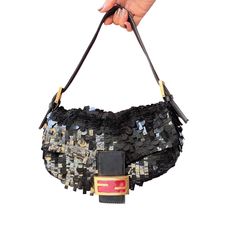 Fendi Baguette Multi-Shape Black Sequins With Red Buckle Fendi Baguette Glitter Black Designer Evening Baguette Bag With Gold-tone Hardware, Designer Baguette Bag With Branded Hardware For Evening, Luxury Baguette Shoulder Bag For Party, Designer Baguette Bag For Party, Luxury Baguette Bag For Party, Designer Evening Baguette Bag, Designer Black Baguette Bag, Vintage Market, Fendi Baguette