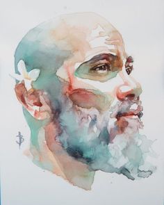 a watercolor painting of a man's face