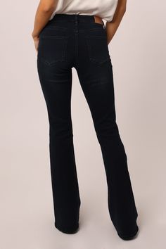 High rise flare leg jeans. It's the lovable fit that sits slightly lower on the waist and fitted skinny in the hips through the knee. Full inseam on stretch denim accented with tailored center inseam press, handsanding hip & spider knee whiskers, buttery soft & rich dark indigo shade.9 1/2" Front Rise (include waistband), 21" Leg Opening, 34" inseam (Size 27) 54% COTTON 22% POLYESTER 14% TENCEL 9% RAYON 1% SPANDEX Machine wash cold, Tumble dry low Imported Zip fly and button closure Five-pocket Jeans West, High Rise Flare Jeans, Flare Leg Jeans, Cropped Denim Jacket, Dark Indigo, Trend Forecasting, Cropped Denim, Flare Jeans, Stretch Denim