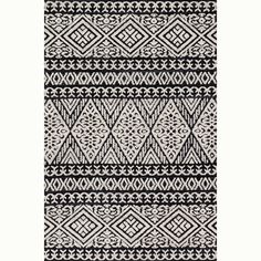 a black and white rug with an intricate design