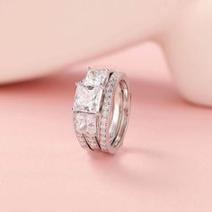 Princess Cut Sterling Silver Engagement Ring Set with CZ Stones - Wnkrs Silver Engagement Ring Set, Ring Enhancer, Silver Engagement Ring, True Romance, Favorite Sayings, Sterling Silver Engagement Rings, Three Stone Engagement, Three Stone Engagement Rings, Silver Engagement Rings