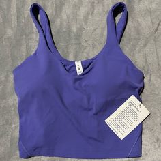 Nwt, I Got This As A Gift So The Price Is Cut Off But It Is Too Small For Me. Super Cute Color - It’s Like A Blueish Purple Casual Purple Sleeveless Sports Bra, Purple Sleeveless Top With Medium Support, Purple Bra-friendly Tops For Yoga, Medium Support Purple Sleeveless Top, Purple Seamless Tops For Gym, Purple Gym Tops With Built-in Bra, Purple Moisture-wicking Tops With Medium Support, Purple Workout Tops With Built-in Bra, Casual Fitted Purple Sports Bra